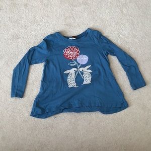 Turquoise bunny with flower